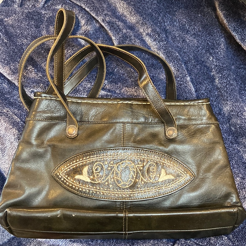 Black purse that I believe is leather and has embroidery.
